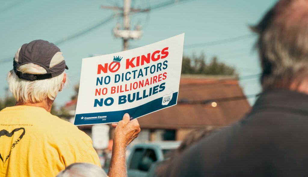 protestor with anti authority sign at rally